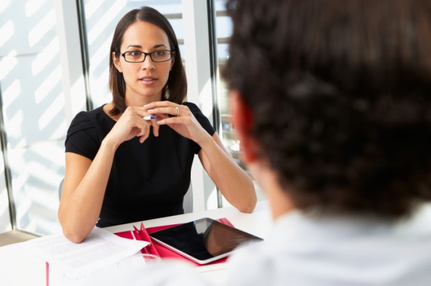 Two professionals discussing business strategy for nonprofit placements